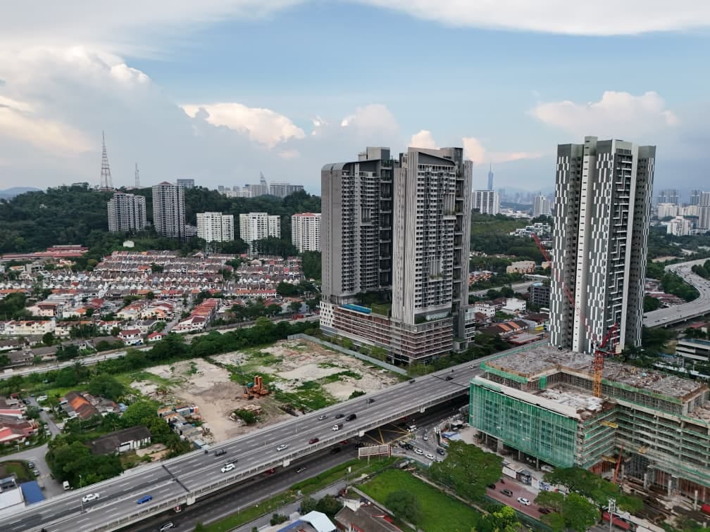 Old Klang Road cityscape aerial with KLCC and KL Tower in the distance