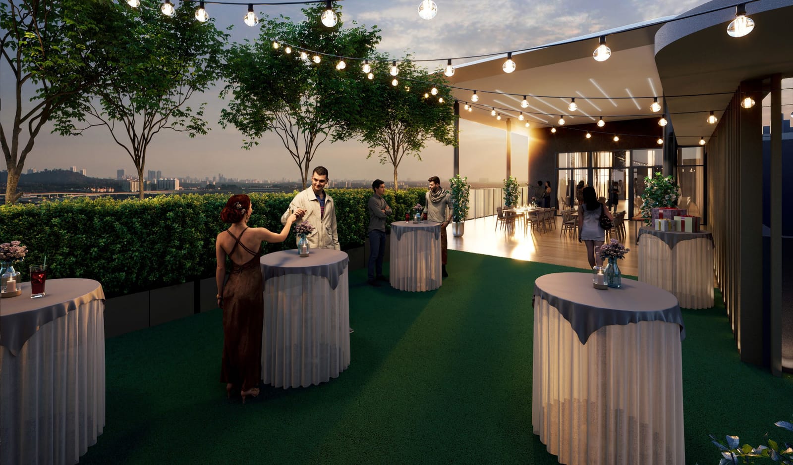 Sky garden lounge of a modern Old Klang Road serviced residence at dusk overlooking the Kuala Lumpur skyline